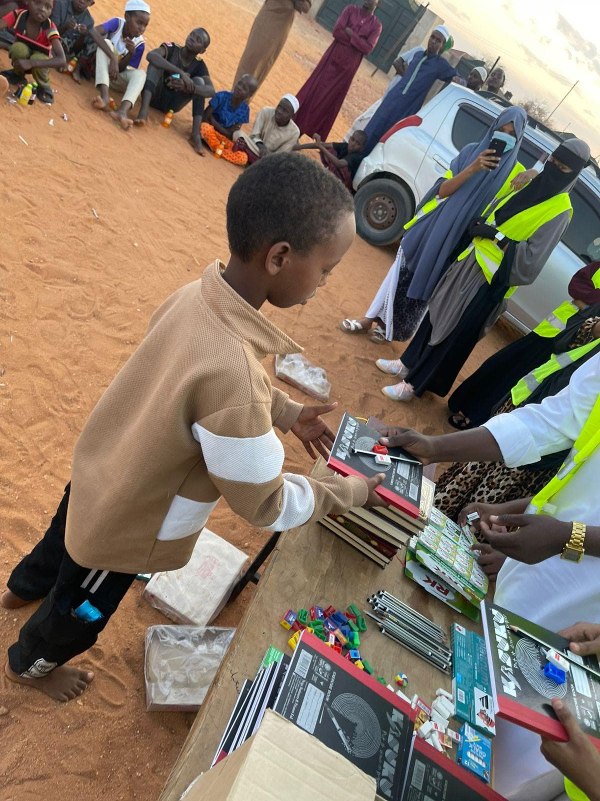 GNO education support — children in Garissa receiving school supplies